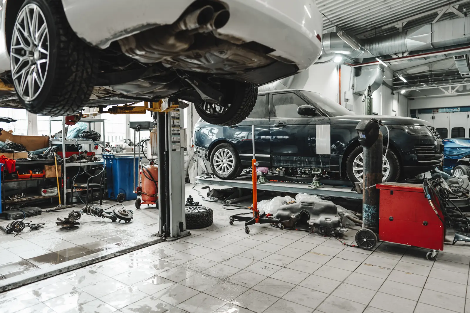 Vehicle raised on a lift for tire and wheel service